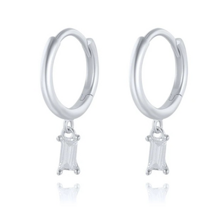 A pair of silver hoop earrings with clear rectangle gemstone drop pendants.