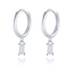 A pair of silver hoop earrings with clear rectangle gemstone drop pendants.