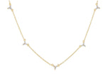 Gold necklace with small diamonds on a white background