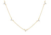 Gold necklace with small diamonds on a white background