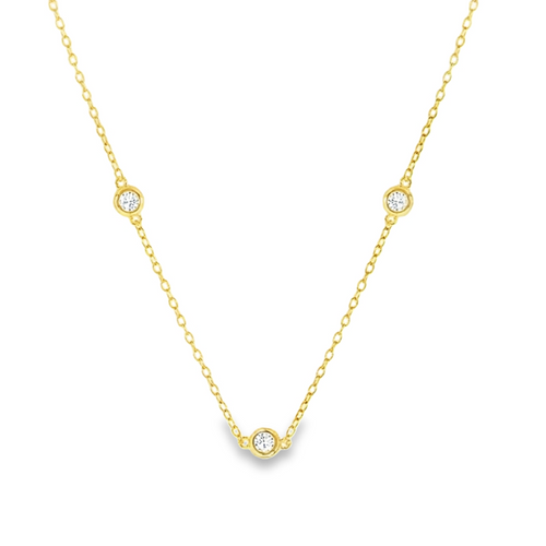 Gold necklace with three clear gemstone accents on a fine chain. Crafted in sterling silver, this minimal design makes the perfect gift or everyday layering piece by Teall Jewellery.