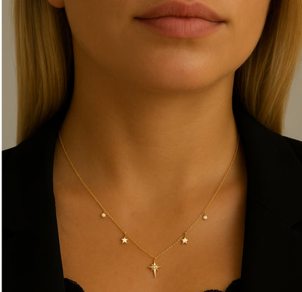 Gold Necklace with Multiple Star Pendants and Clear Gemstone Detailing by Teall