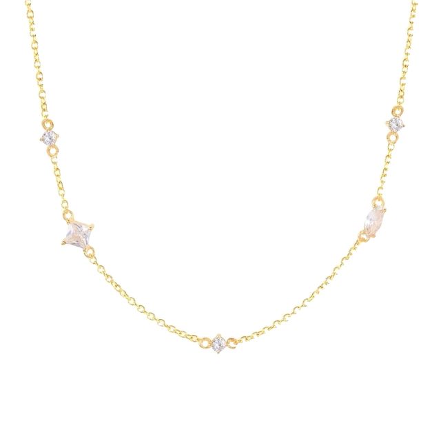 An 18k gold vermeil necklace with clear gemstone detailing.