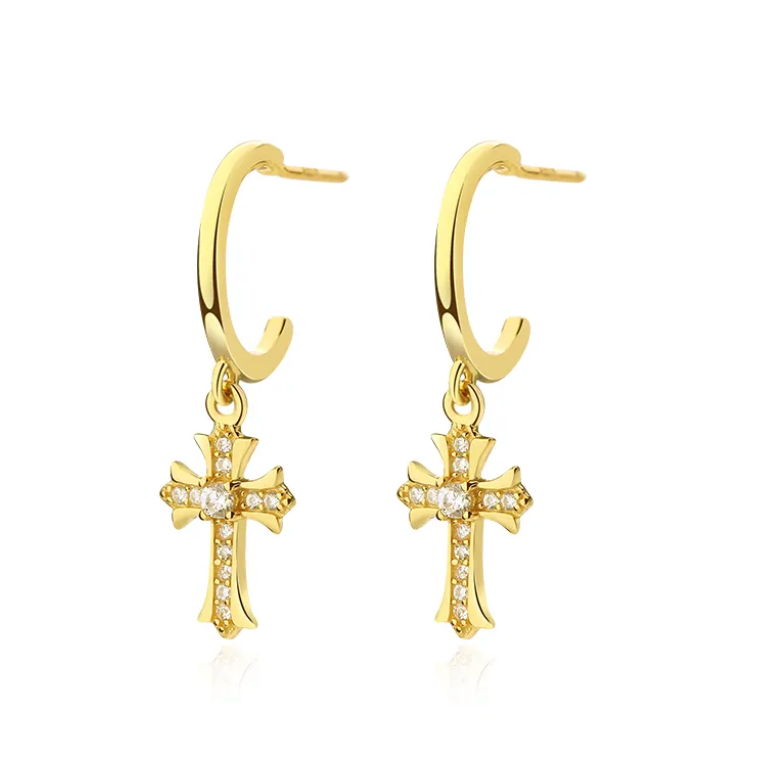A pair of gold-colored hoop earrings featuring a cross design with inset stones.