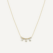Gold necklace with small diamonds on a white background