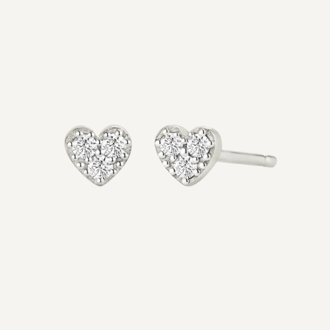 Teall Jewellery gold-plated heart-shaped stud earrings with sparkling stone clusters, dainty and elegant design on a white background.