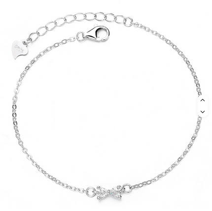 Teall Jewellery sterling silver bracelet featuring a delicate bow design at the centre with an adjustable chain and clasp, displayed on a white background
