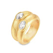 Teall Jewellery gold statement ring with two stacked bands and offset oval white gemstones, bold and modern design on a white background