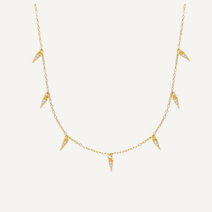 Teall Jewellery gold necklace featuring small clear stone triangle pendants evenly spaced along a fine chain, minimalist and elegant design on a white background