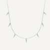 Teall Jewellery gold necklace featuring small clear stone triangle pendants evenly spaced along a fine chain, minimalist and elegant design on a white background