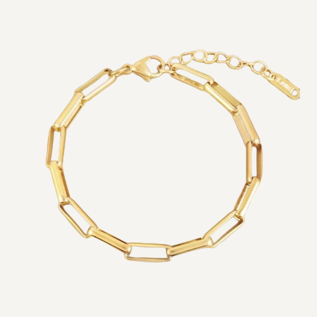 Gold bracelet on a white background