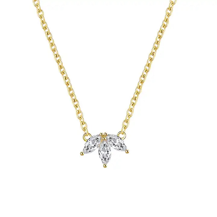 A gold marquise cluster necklace with a delicate chain and three shimmering marquise-shaped stones.