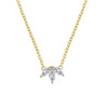 A gold marquise cluster necklace with a delicate chain and three shimmering marquise-shaped stones.
