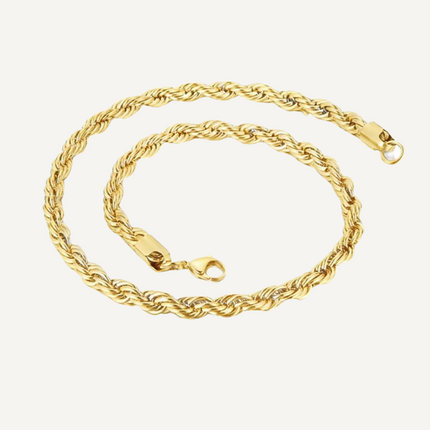 Gold rope chain necklace on a white background