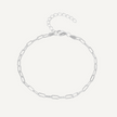 Silver chain bracelet on a light gray background