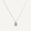 Silver necklace with a rectangular pendant on a light gray background