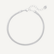 Silver snake chain bracelet on a light gray background